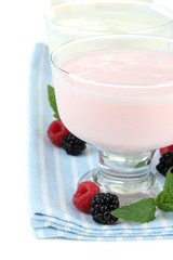 Delicious yogurt with berries isolated on white