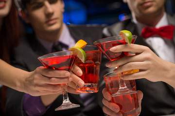 close-up of hands with glasses