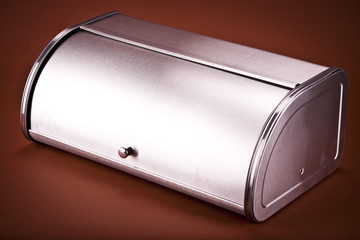 closed metallic breadbasket isolated on white background