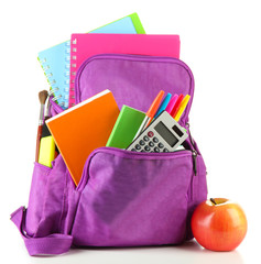 Fototapeta Purple backpack with school supplies isolated on white obraz