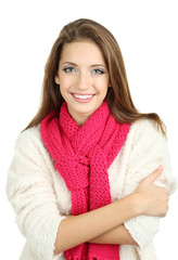 Beautiful smiling girl in warm knit scarf isolated on white