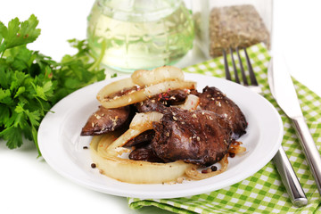 Appetizing fried chicken livers on plate isolated on white