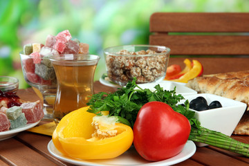Traditional Turkish breakfast on table on bright background