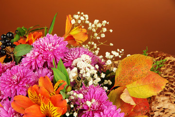 Flowers composition on brown background
