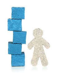 Little man and building blocks isolated on white