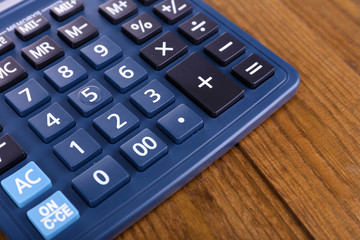 Digital calculator on table close-up