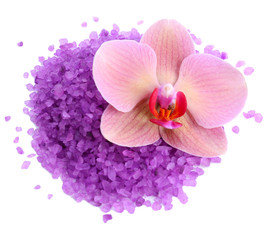 Beautiful blooming orchid flower  and heap of sea salt,