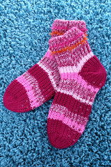 Woolen socks, on color background