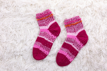 Woolen socks, on color background