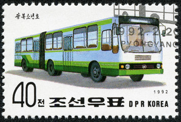 stamp printed in North Korea shows motor bus