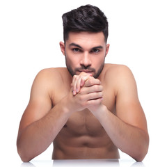 Fototapeta premium beauty young man holding his palms together