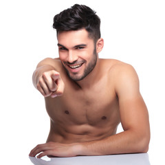 Fototapeta premium young naked man pointing finger to camera