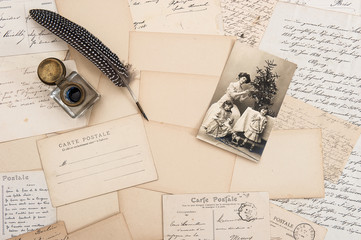 old letters, vintage postcards and antique feather pen