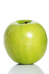 One green separated apple on white.