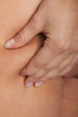 Close up on female's back.