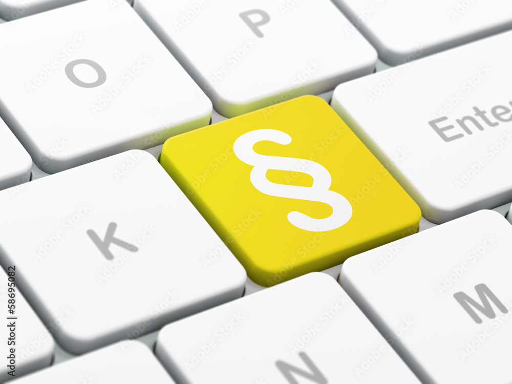 Poster law concept: paragraph on computer keyboard background
