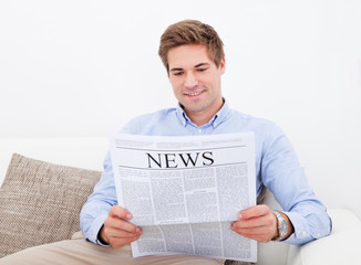 Man Reading Newspaper
