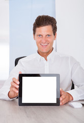 Man Holding Digital Tablet