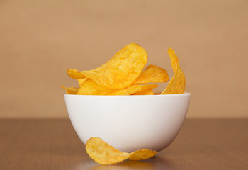 Faience bowl with chips against paper