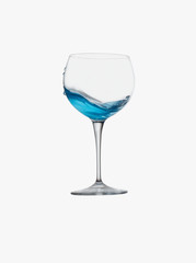 Glass with blue liquid
