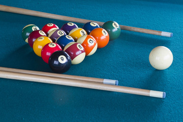 Billiard balls on table.