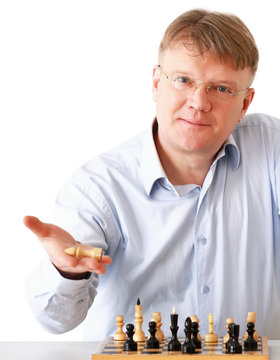 Man playing chess, isolated on white background.