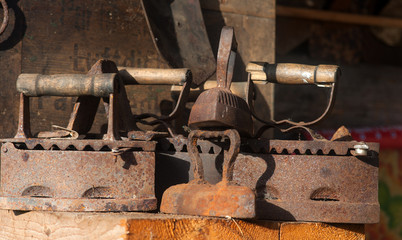 collection of very old rusty irons