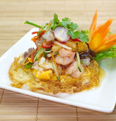 spicy salad with fried egg, Thai food