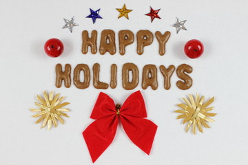 Schriftzug Happy Holidays mit Schleife