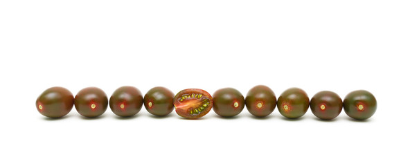 black cherry tomatoes on a white background