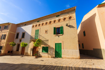 Naklejka premium Houses in old town of Alcudia town on Majorca island, Spain