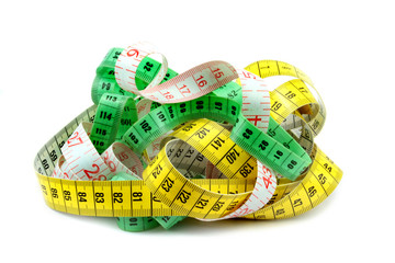 Various tape measure on white background.