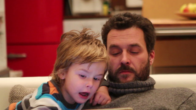 Father and Son with digital tablet