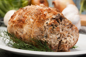 Meat roll stuffed with mushrooms