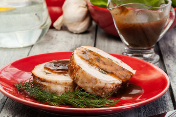 Slices of pork roast stuffed with mushrooms