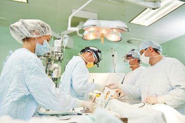 surgeons team at operation