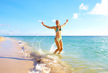 Happy woman on Miami beach.