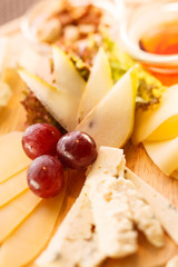 cheese plate with grapes