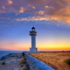 Fototapeten Formentera sunset in Barbaria cape lighthouse © lunamarina