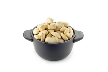 A little black ceramic dish with white cannellini beans