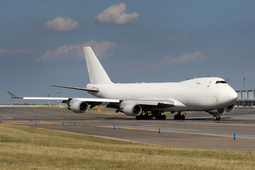 White airplane at airport - 58712624