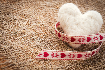 Heart made ​​of wool. Background