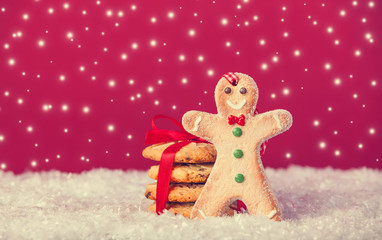 Obraz na płótnie Canvas Christmas cookies and snow at background