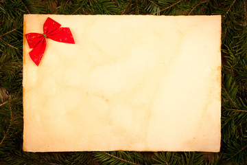 Rustic paper with little red ribbon