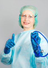young woman surgeon holding a stethoscope