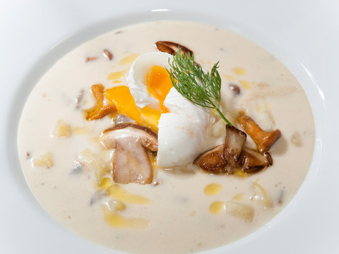 Traditional Czech potato soup Kulajda with roasted mushrooms