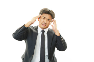 頭痛のビジネスマン
