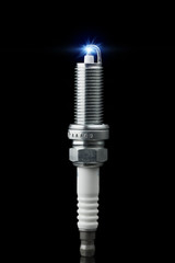 working spark plug with blue sparkle