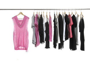 Variety of casual fashion clothing on hangers