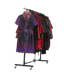 female clothes hanging on clothes rack on white